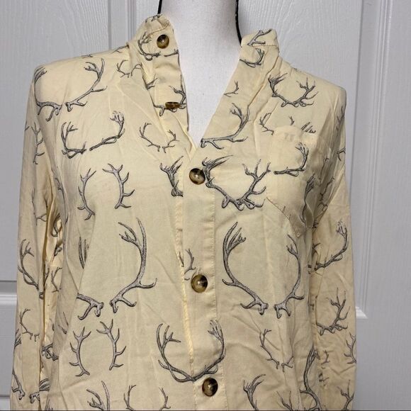 unique antlers on an ivory colored button down top - Picture 2 of 10